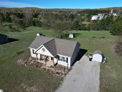 Beach Home For Sale in Maple City, Michigan
