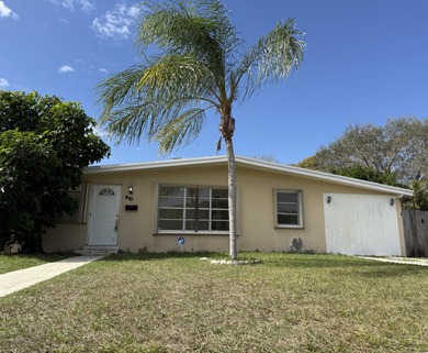 Beach Home For Sale in Lake Park, Florida