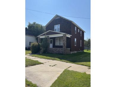 Beach Home For Sale in Manistee, Michigan