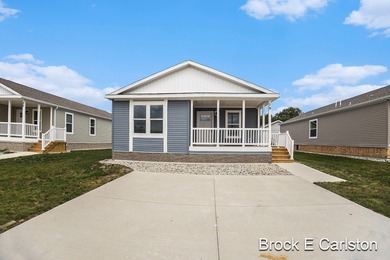 Beach Home For Sale in Norton Shores, Michigan
