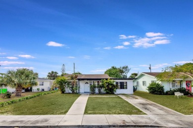 Beach Home For Sale in Lake Park, Florida