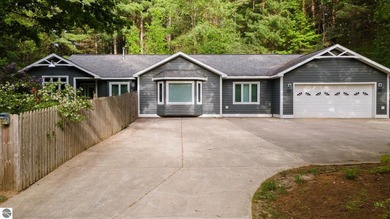 Beach Home For Sale in Williamsburg, Michigan