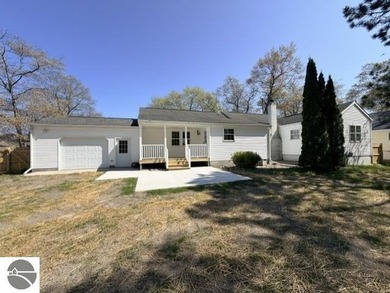 Beach Home For Sale in East Tawas, Michigan