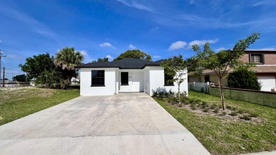 Beach Home For Sale in Riviera Beach, Florida