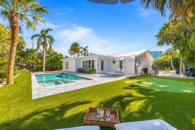 Beach Home For Sale in Holmes Beach, Florida