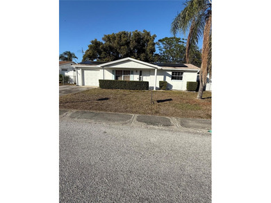 Beach Home For Sale in Holiday, Florida