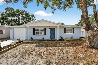 Beach Home For Sale in Holiday, Florida