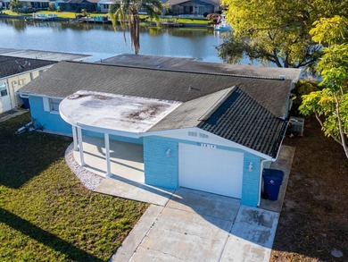 Beach Home For Sale in Holiday, Florida