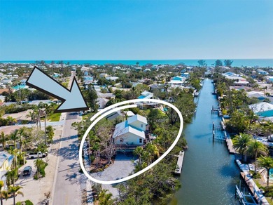 Beach Home For Sale in Holmes Beach, Florida