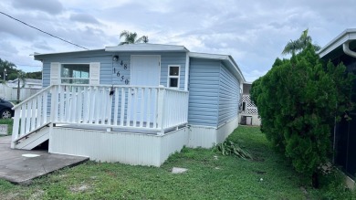 Beach Home For Sale in Holiday, Florida