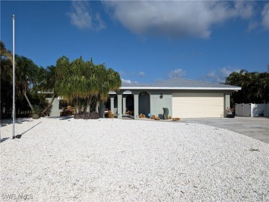Beach Home For Sale in Bokeelia, Florida