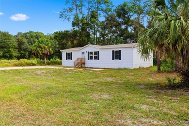 Beach Home For Sale in Inglis, Florida