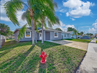 Beach Home For Sale in Riviera Beach, Florida