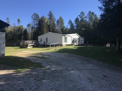 Beach Home For Sale in Hessel, Michigan