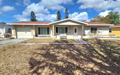 Beach Home For Sale in Kenneth City, Florida