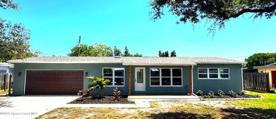 Beach Home For Sale in Satellite Beach, Florida