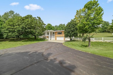 Beach Home For Sale in Alden, Michigan