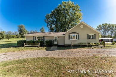 Beach Home For Sale in New Era, Michigan