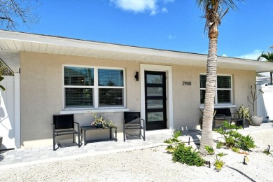 Beach Home For Sale in Holmes Beach, Florida