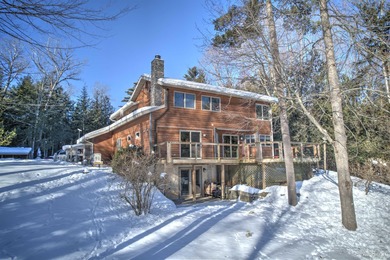 Beach Home For Sale in Bark River, Michigan