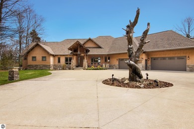 Beach Home For Sale in Kewadin, Michigan
