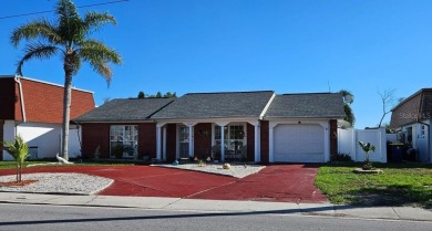 Beach Home For Sale in Holiday, Florida