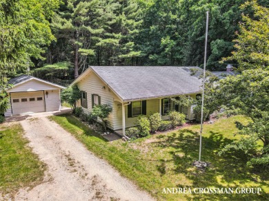 This cozy cottage is in a prime location and just a short walk - Beach Home for sale in Fennville, Michigan on Beachhouse.com