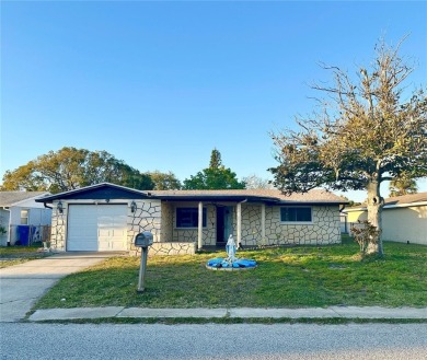 Beach Home For Sale in Holiday, Florida