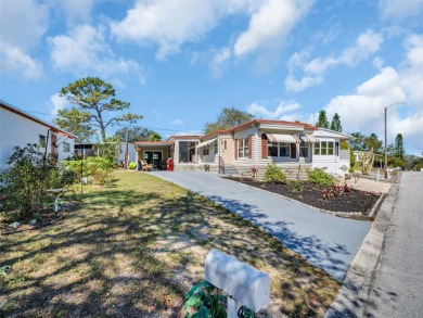 Beach Home For Sale in Tarpon Springs, Florida