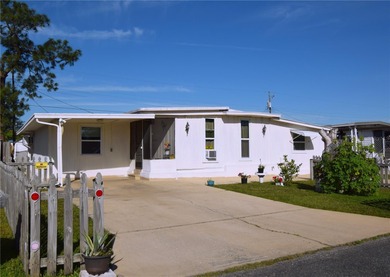 Beach Home For Sale in Holiday, Florida
