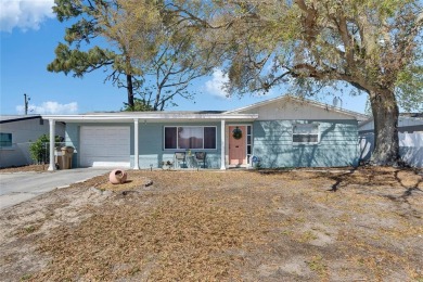Beach Home For Sale in Holiday, Florida