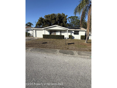 Beach Home For Sale in Holiday, Florida