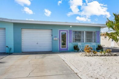Beach Home For Sale in Holmes Beach, Florida