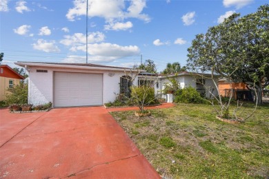 Beach Home For Sale in Holiday, Florida
