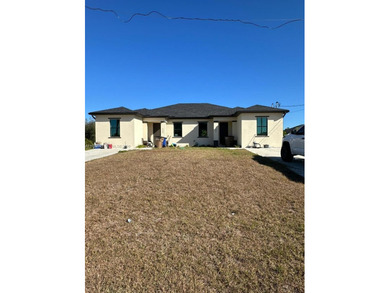 Beach Townhome/Townhouse For Sale in Lehigh Acres, Florida