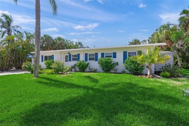 Beach Home For Sale in Holmes Beach, Florida
