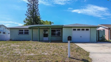 Beach Home For Sale in Holiday, Florida