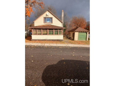 Beach Home For Sale in Big Bay, Michigan