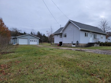 Beach Home For Sale in Manistee, Michigan