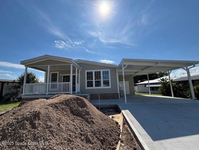Beach Home For Sale in Barefoot Bay, Florida