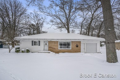 Home For Sale in Norton Shores image photo picture