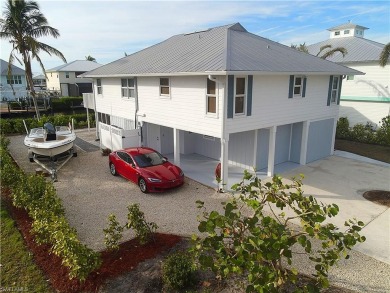 Beach Home For Sale in Bokeelia, Florida