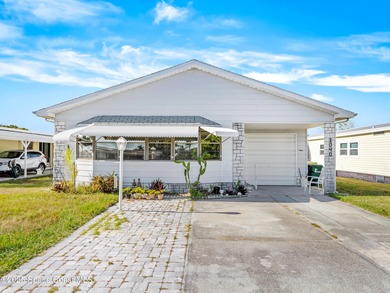 Beach Home For Sale in Barefoot Bay, Florida