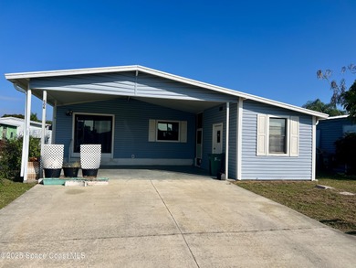 Beach Home For Sale in Barefoot Bay, Florida