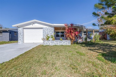 Beach Home For Sale in Holiday, Florida