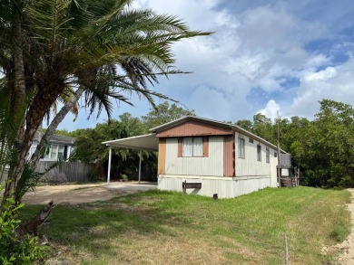 Beach Home For Sale in Plantation Island, Florida