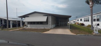 Beach Home For Sale in Holiday, Florida