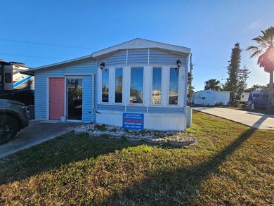 Beach Home For Sale in Bokeelia, Florida