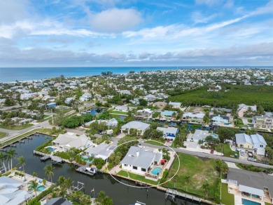 Beach Home For Sale in Holmes Beach, Florida