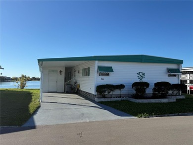 Beach Home For Sale in Holiday, Florida